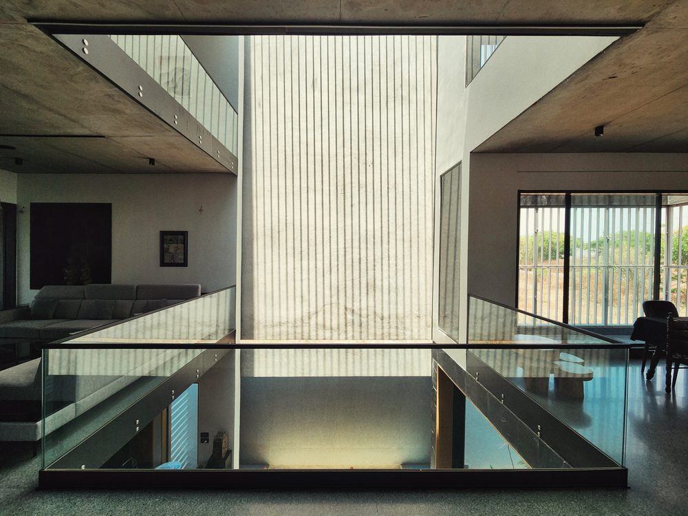 Black Rock House — The pool bridge at dusk