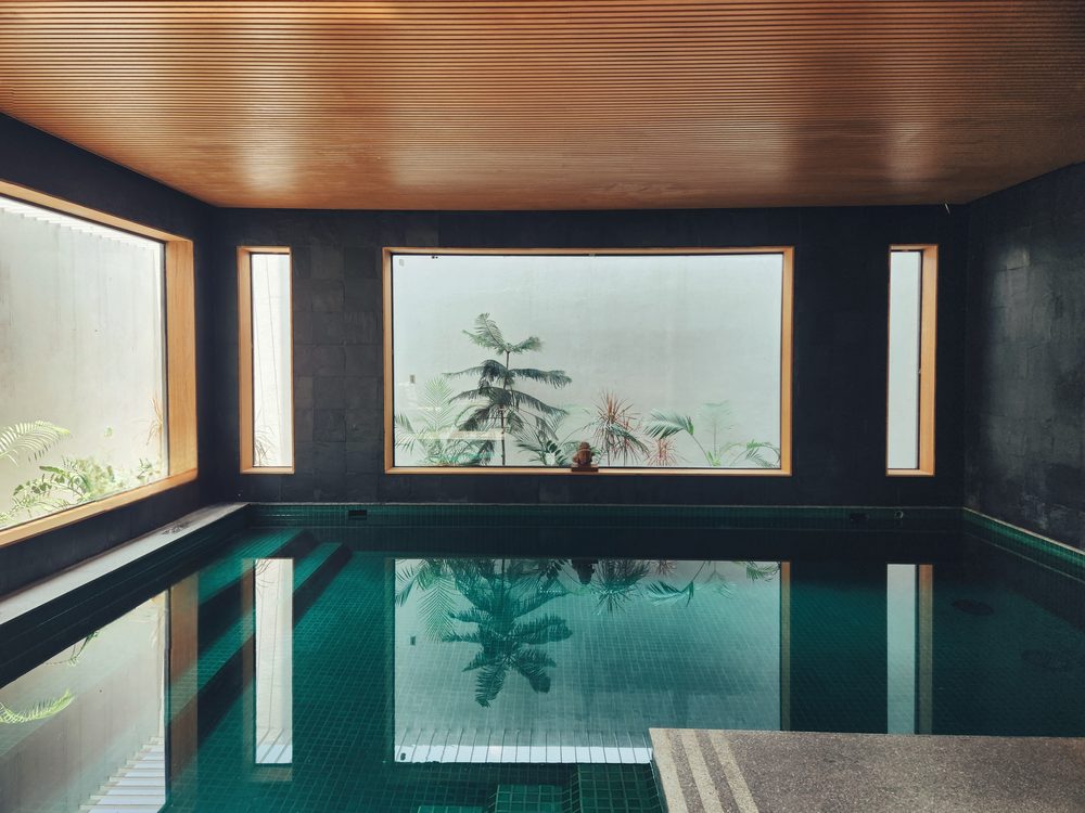 Black Rock House — Indoor pool under a timber ceiling