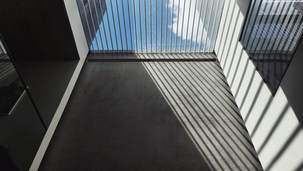 Black Rock House — Pergola shadows in the court