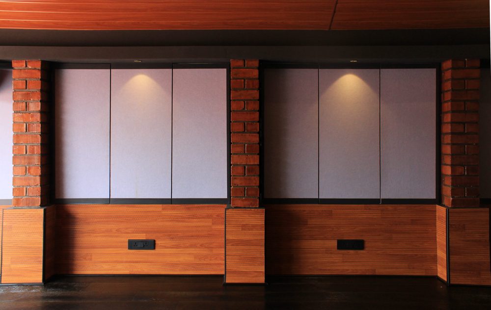 H-12 Walton Road — Panelled wall — brick, timber, fabric