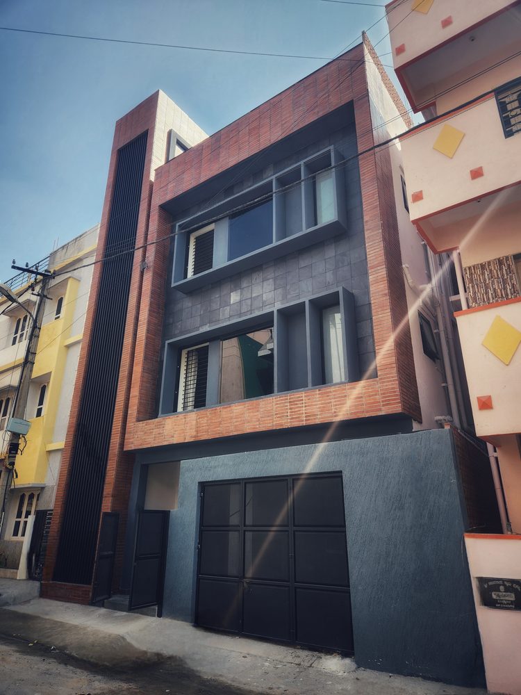House of Volumes — The two volumes from the street