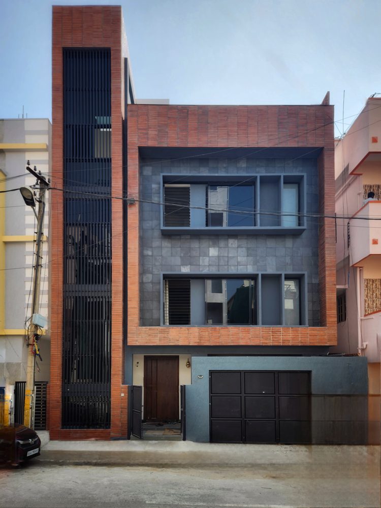 House of Volumes — Street front and gate